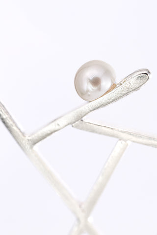 Pick up sticks | sterling silver with a white pearl necklace
