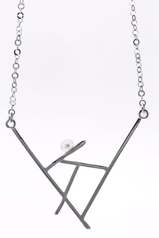 Pick up sticks | sterling silver with a white pearl necklace